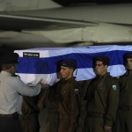 coffins-bulgaria Israeli soldiers carry the five coffins holding Israeli citizens Itzik Colangi, 28, Amir Menashe, 28, Maor Harosh, 25, Elior Price, 26, and Kochava Shriki, 44, killed in a suicide bombing attack in Bulgaria July 18, at a ceremony after the bodies arrived at Ben-Gurion Airport. Photo: Amos Ben Gershom/GPO/FLASH90.