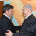 On Feb. 19, 2012, Prime Minister Benjamin Netanyahu congratulates Dr. Yehuda David upon his acquittal in France's highest court after he had been sued for libel by Jamal al-Dura for refuting claims that Jamal was injured in a 2000 shooting in the Gaza Strip. Israel was further vindicated in relation to the incident Sunday when a government report said the IDF was not responsible for the death of Jamal's son, Muhammad. Photo: Moshe Milner/GPO/Flash90.