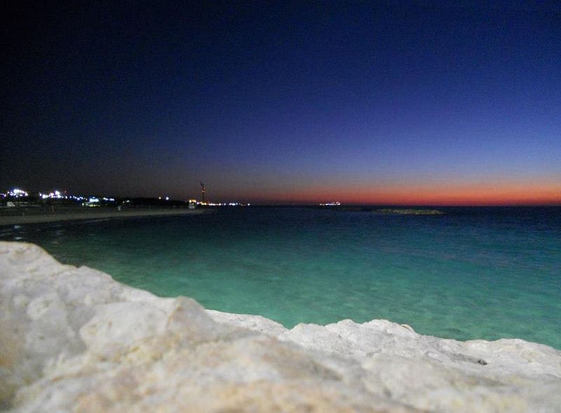 Night view of the Mediterranean Sea, with Ashkelon Port in the background. Photo: WikiCommons.