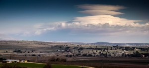 Golan Heights: lenticular clouds hover over Quneitra Crossing with Syria. Photo: Dave Bender