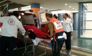 Jerusalem stabbing victim brought to hospital. Photo: Ch2 News. Jerusalem stabbing victim brought to hospital. Photo: Ch2 News.