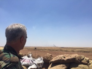 A veteran fighter looks out at the battleground with ISIS. Photo: Seth Frantzman.