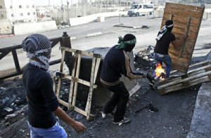 Palestinians throwing fire bombs. Photo: Elder of Ziyon.
