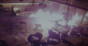 The scene of the arson attack at the Ta'am Grill and Deli in Manchester. Photo: Screenshot.
