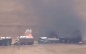 syriatank Syria rebel forces shell Hezbollah 50-truck convoy. Photo: Screenshot.