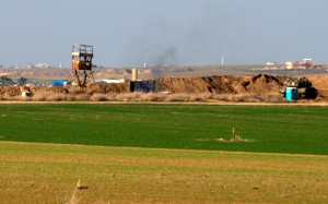 Israeli farmland, a tank and watchtower alongside Gaza Photo: Dave Bender Israeli farmland. Photo: Dave Bender.