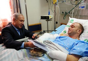 PM Benjamin Netanyahu and IDF Cap. Ziv Shilon. Photo: GPO PM Benjamin Netanyahu and IDF Cap. Ziv Shilon. Photo: GPO