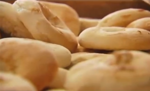 Bialys from Kossar's, formerly owned by Juda Engelmayer and his wife. Photo: YouTube.
