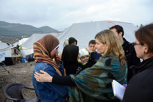 Syrian refugees at a camp in Turkey in 2013 with USAID's Nancy Lindborg. Photo: State Department.