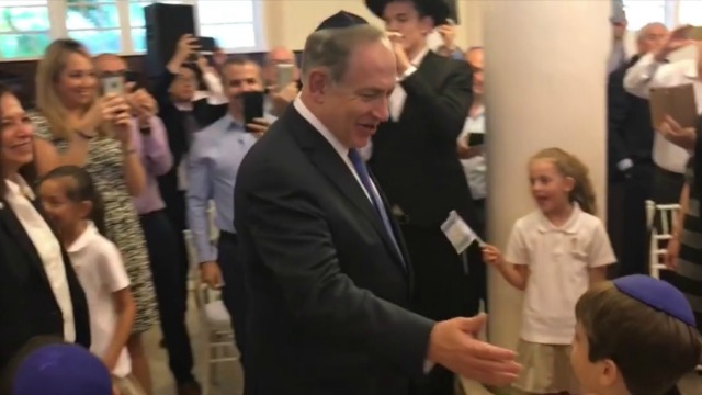 Israeli Prime Minister Benjamin Netanyahu enters the Maghain Aboth Synagogue in Singapore on Monday. Photo: Screenshot.