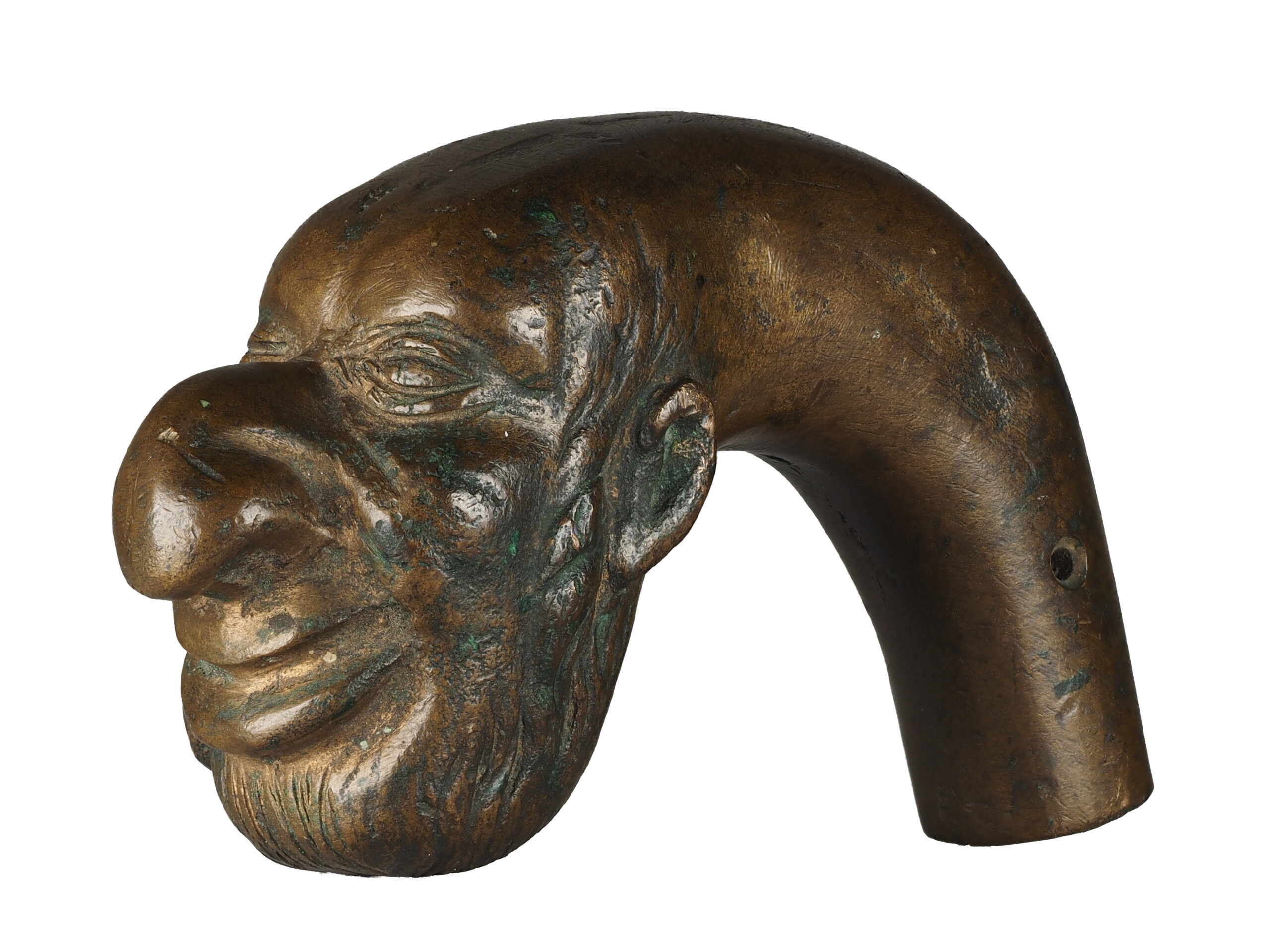 The crown of a walking stick in the form of a maliciously distorted depiction of a “Jew” with an oversized hooked nose, swollen lips, a full beard, and side curls. Image: Langerman collection