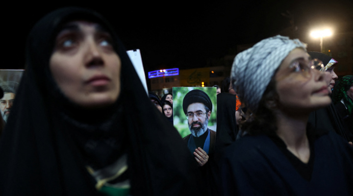 A woman holds an image of Iran's Supreme Leader Mojtaba Khamenei, during a rally in Tehran, Iran, June 1, 2026. Photo: Majid Asgaripour/WANA (West Asia News Agency) via REUTERS